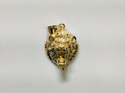 In the center: a lion head pendant with plain 10 and 14 karat gold options front facing - Lucky Diamond
