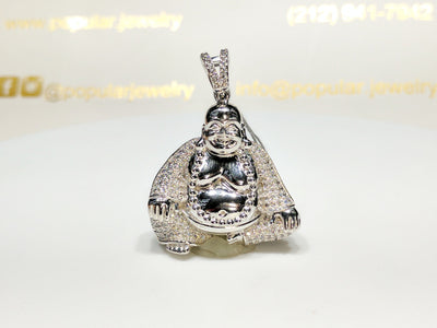 In the center: a sterling silver Seated Laughing Buddha Pendant iced out with cubic zirconia set in micropave style made by Lucky Diamond in New York City